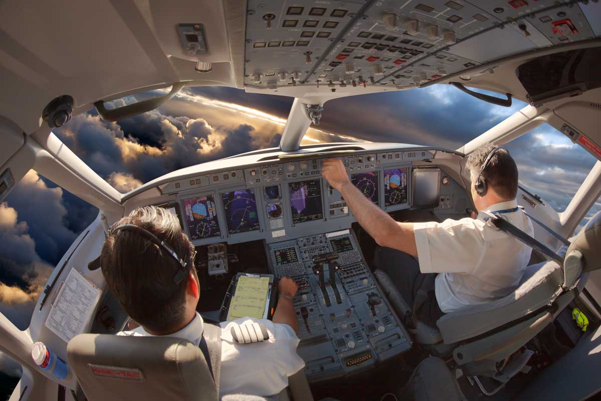 Airline pilot salary pilots in cockpit