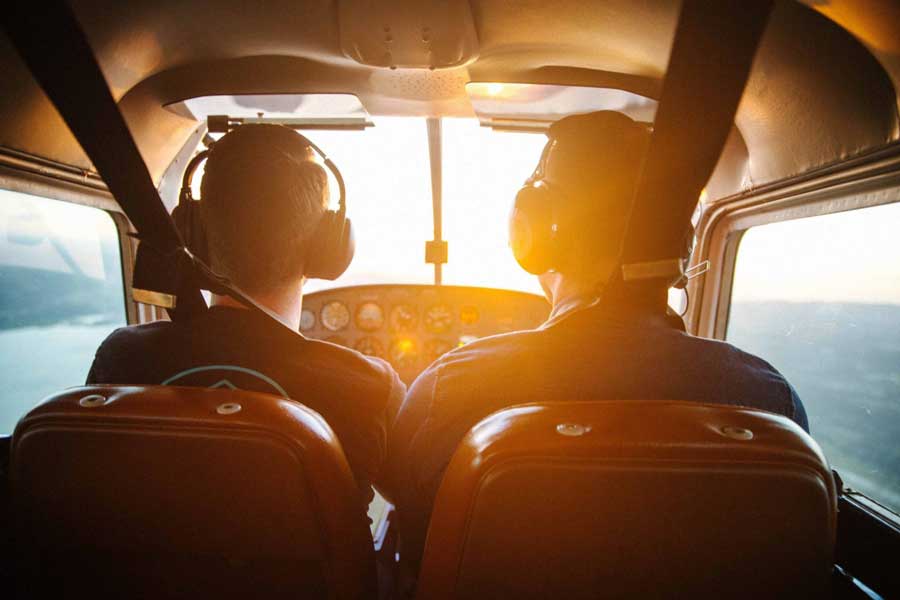 Student pilot and instructor flying