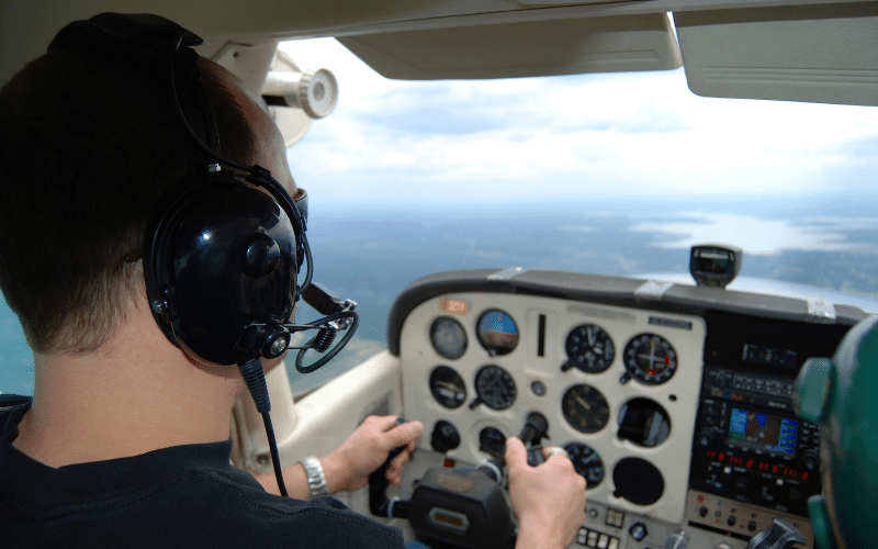 Flight student in the plane doing accelerated flight training