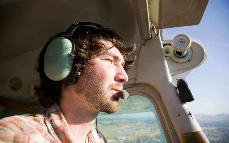 Pilot looking at the view from above after a color blind test.