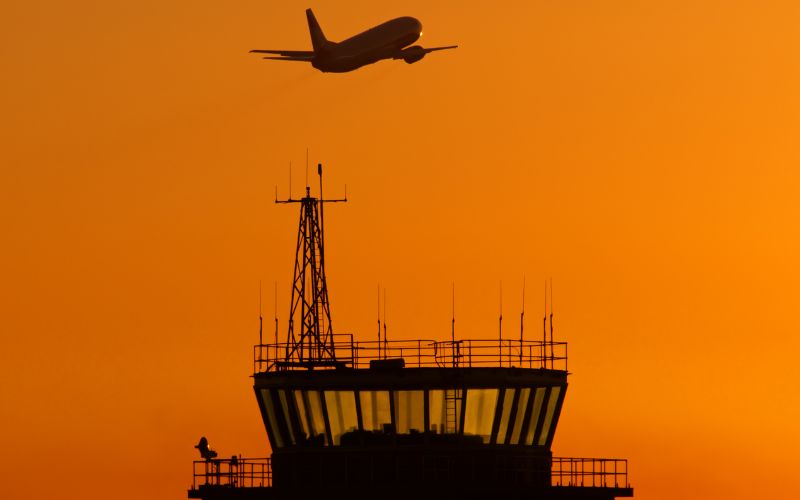 air traffic control tower at sunset